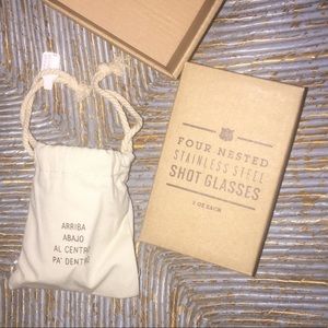 4 stainless steel shot glasses and draw string bag